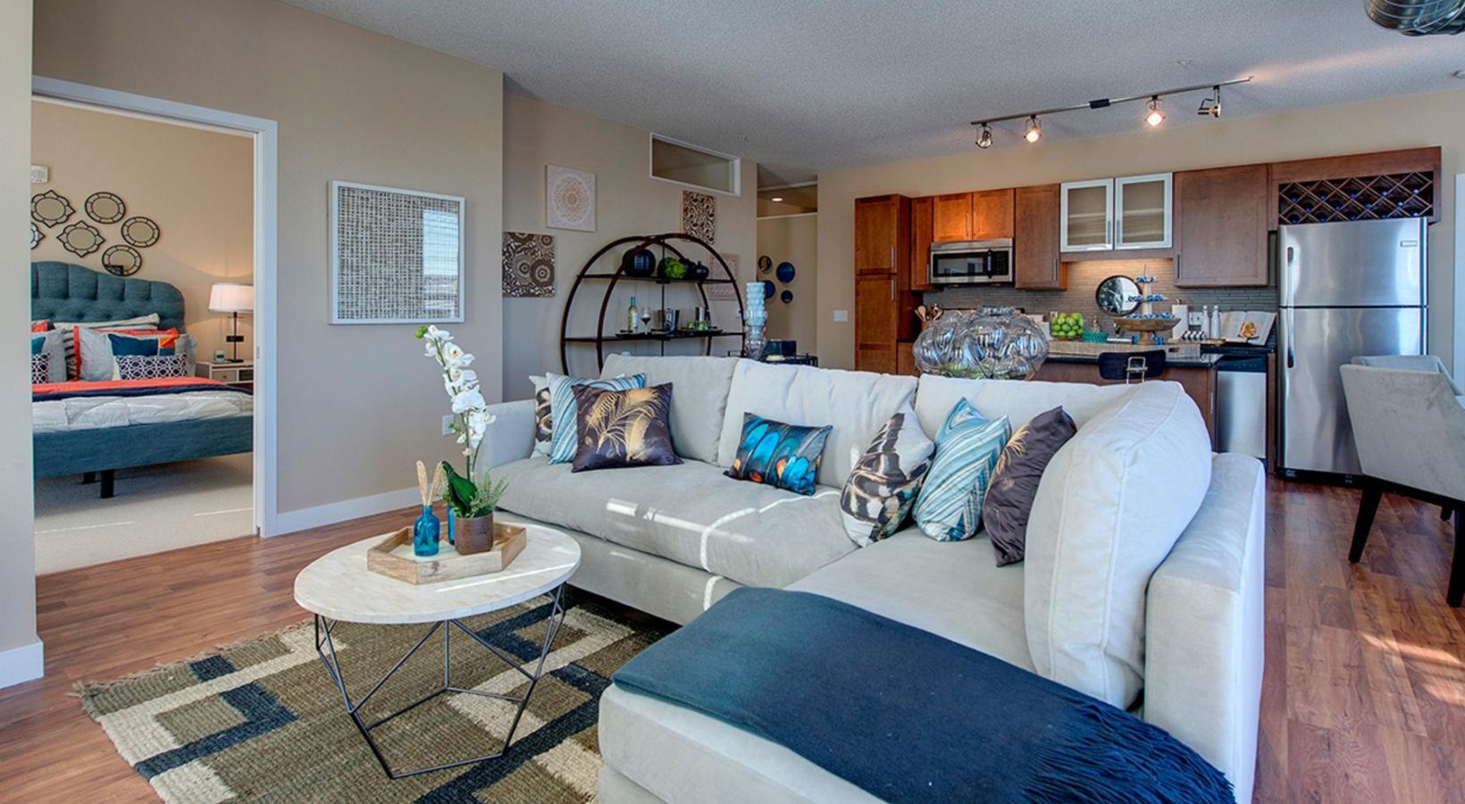 a living room with a couch and a table