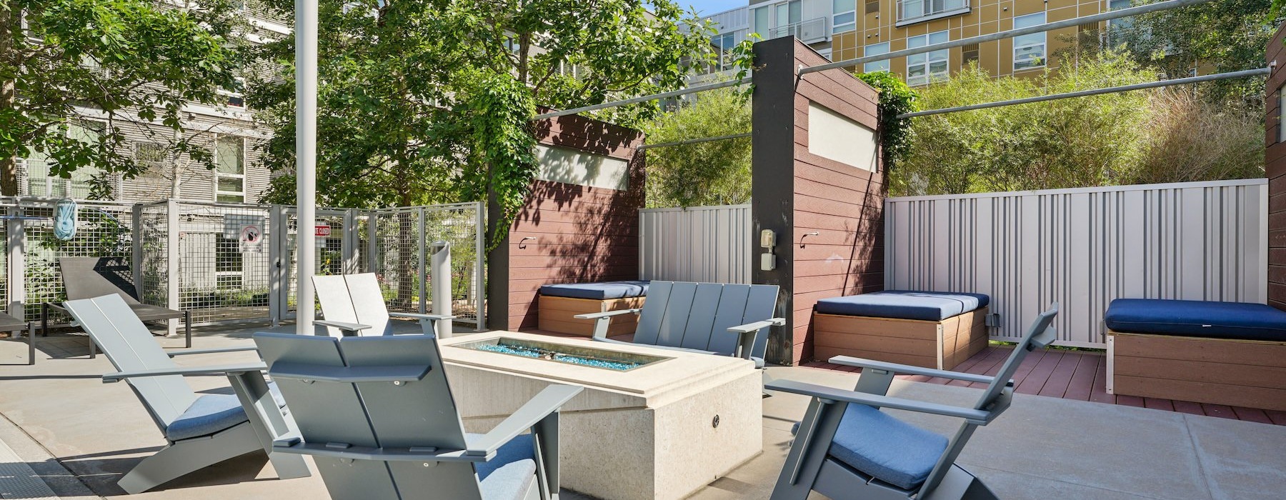 a fire pit with chairs