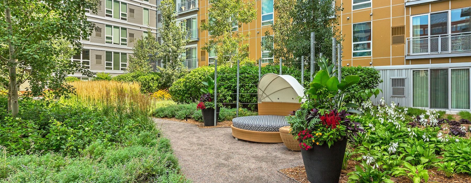 a garden in front of a building