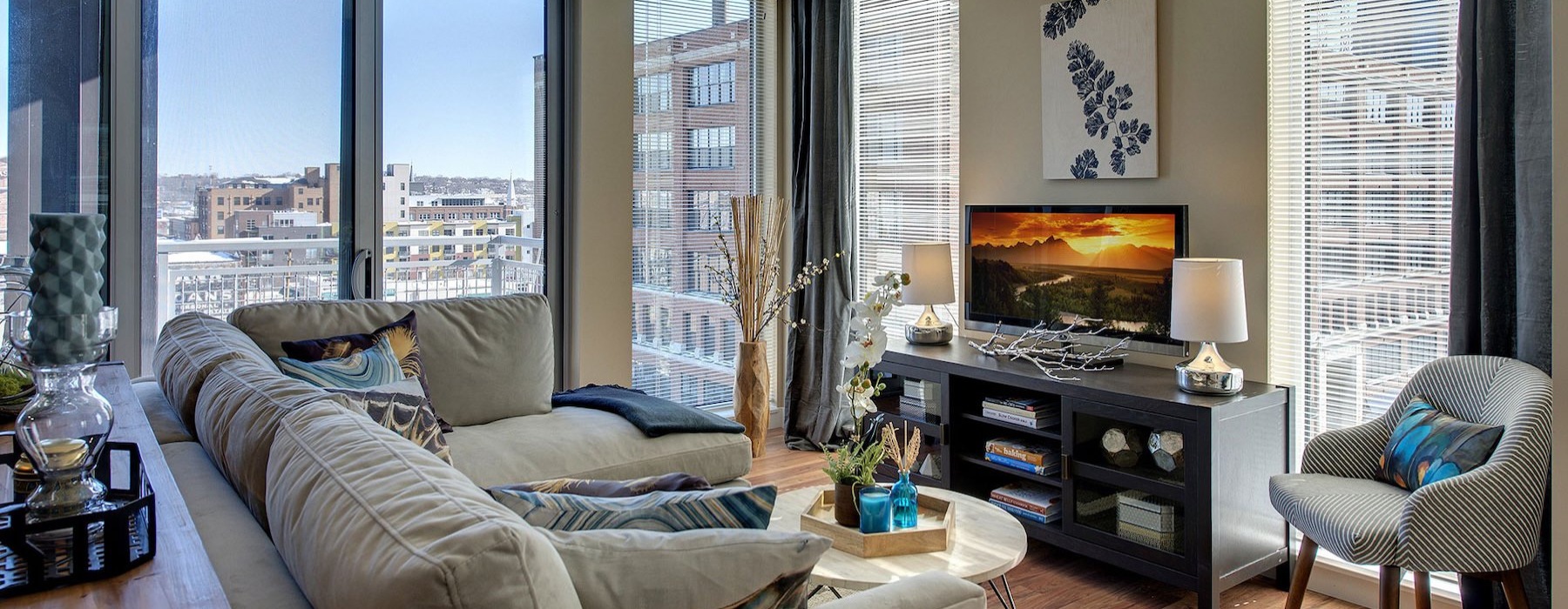 a living room with a tv and a couch
