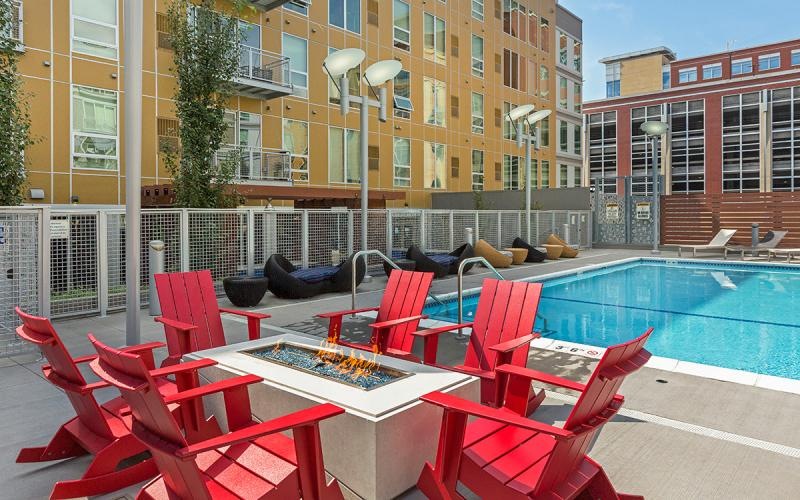 a pool with chairs around it
